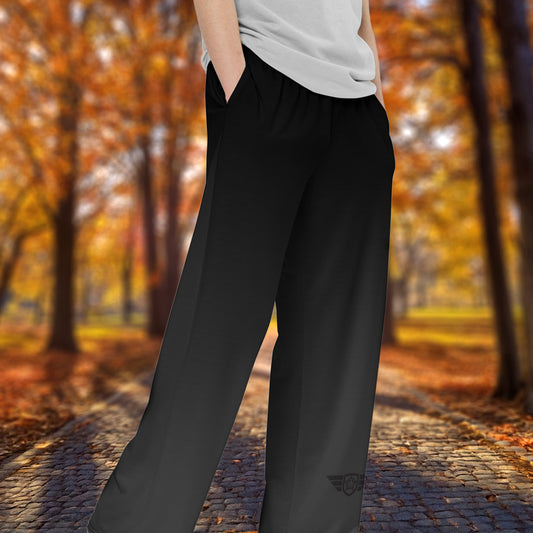 Person wearing HGS Flight Athletic Pant with a blurred autumn forest background