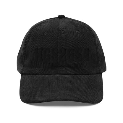 His Good Stuff's Autumn Catalog HGS26S4 Corduroy Cap, front, 100% cotton corduroy with an adjustable golden buckle in the back, on a white background. Graphic displays in black thread, 3-D embroidered HGS26S4