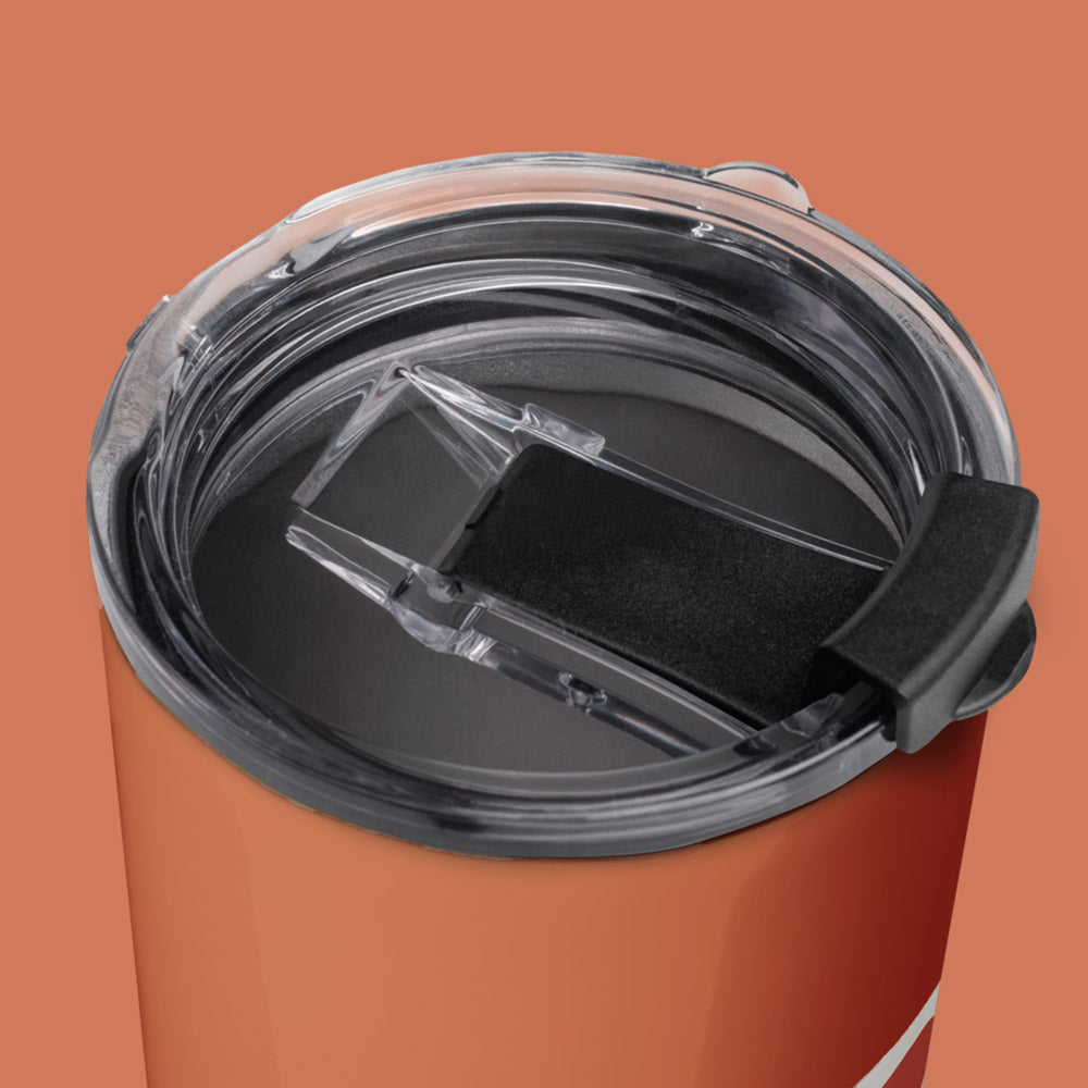 His Good Stuff's Autumn Catalog HGS26S4 Travel Tumbler, top detail view, 20 oz, glossy stainless steel, vacuum-sealed insulation, on a flat Brandied Melon background.